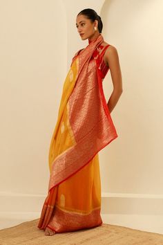 Yellow and orange ombre banarasi kora organza saree with gold toned floral garden borders and buttis detailing. Comes with an unstitched blouse piece. - Aza Fashions Traditional Orange Pre-draped Saree With Zari Weaving, Elegant Festive Orange Blouse Piece, Fitted Orange Chanderi Saree, Silk Saree With Resham Embroidery In Orange, Anarkali Chanderi Blouse Piece In Orange, Orange Anarkali Chanderi Blouse Piece, Anarkali Style Orange Chanderi Blouse Piece, Unstitched Festive Orange Blouse Piece, Festive Orange Chanderi Blouse Piece