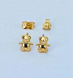 14k Yellow Gold Small Teddy Bear Stud Earrings Double Notched posts for one more layer of security and heavy backs  Solid Gold Not Gold Filled, Not Gold Plated Pair or Half Pair Each diamond and jewelry checked, inspected and graded by a GIA Diamond Graduate Gemologist     Trendy, dainty, minimalist, fashionable, fancy, fine quality  14k solid gold teddy bear stud and second hole earrings. Description     Metal Type : 14k. Yellow / Solid Gold / Not Gold Filled, Not Gold Plated     Measurement : Second Hole Earrings, Small Teddy Bears, Blue Stone, 925 Sterling Silver Jewelry, Jewelry Earrings Studs, Gold Filled, Sterling Silver Jewelry, Solid Gold, Gold Plate