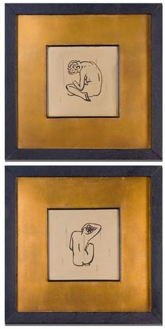 two framed pictures with drawings on them in black and gold frames, one has a drawing of