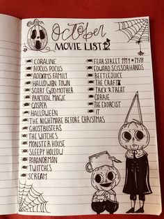 a halloween movie list in a notebook on a red table with black and white writing