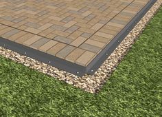 a 3d image of a brick patio with grass and gravel in the foreground, surrounded by stones