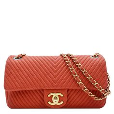 Item Details: The Chanel Medallion Charm Flap Medium Wrinkled Chevron Leather Crossbody Bag In Red Combines A Unique Wrinkled Chevron Design With Luxurious Leather. Featuring A Charming Medallion Accent, This Stylish Crossbody Bag Adds A Bold Touch To Any Ensemble. Series: Medallion Charm Flap Medium Style: Crossbody Bag Material: Wrinkled Chevron Leather Color: Red Made: Italy Made Year: 2014-2015 Measurements: L 10" H 6" D 2.5" Accessories: Ddh Dust Bag. Sku: Dd19381 Condition Detail: Good - The Item Shows Signs Of Use, Including Lightly Rubbed Corners And Rubbing On The Strap. Its Gold-Colored Hardware Has Discoloration. Its Interior Is Clean. This Bag Is Without Any Unpleasant Smell Classic Red Quilted Shoulder Bag, Red Quilted Shoulder Bag For Formal Occasions, Red Quilted Shoulder Bag For Formal Events, Formal Red Quilted Shoulder Bag, Red Quilted Leather Shoulder Bag, Designer Red Textured Leather Bag, Luxury Orange Soft Leather Bags, Red Quilted Travel Bag, Luxury Red Textured Leather Shoulder Bag