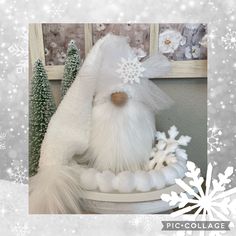 there is a snowman made out of fake fur on the shelf next to christmas trees