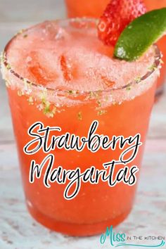 strawberry margarita with lime garnish on the rim and text overlay reads strawberry margarita margarita