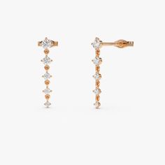 Made to Order Gold Kt: 14K (also available in 18K) Available Gold Colors: Rose Gold, Yellow Gold, White Gold Length of Drop: 20MM - 3/4 Inch Round Diamond: 2 Pcs 1.5 MM Round Diamond: 2 Pcs 1.85 MM Round Diamond: 2 Pcs 2.1 MM Round Diamond: 2 Pcs 2.5 MM Round Diamond: 2 Pcs 2.9 MM Diamond Color & Clarity: G Color SI Clarity Diamond Ctw: 0.50 ctw Gold Colors, Diamond Drops, Diamond Drop Earrings, Diamond Color, Moissanite Diamonds, Lab Created Diamonds, Eternity Bands, Diamond Gemstone, Gold Yellow