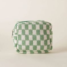 Our classic Checkerboard Knit bag but make it mini! Compact in size at 4" x 6" x 2" it's perfect for storing cosmetics or other essentials. Please note that the plaid pattern may have slight irregularities. Green Rectangular Case Bag With Zipper Pouch, Green Rectangular Cosmetic Bag, Green Rectangular Cosmetic Bag For Daily Use, Rectangular Green Cosmetic Bag For Daily Use, Rectangular Green Cosmetic Bag, Green Rectangular Cosmetic Bag For School, Trendy Green Everyday Cosmetic Bag, Green Rectangular Coin Purse For Everyday Use, Green School Pouch