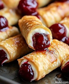 cranberry crescent pastries on a baking sheet