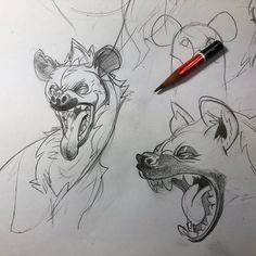 a pencil drawing of some animals with their mouths open