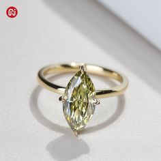 *Title:GIGAJEWE 7*14mm 3ct Marquise Cut Olive Color 9K/14K/18K white gold Moissanite Ring, Engagement Ring Wedding Ring Bridesmaid gift * Material:9K/14K/18K white gold * Center Stone: 7*14mm marquise cut * Color:Olive color * Size from US 4-12 * Band width: Approx 1.5mm/main ring * Custom made band:band can made into 14K/18K/white/rose/yellow gold * Custom made stone:stone can made into white/yellow/blue/gold/amber/black color Olive Engagement Ring, Marquise Green Engagement Ring, Green Marquise Brilliant Cut Rings, Elegant Yellow Marquise Cut Ring, Marquise Green Ring In 14k Gold, Peridot Marquise Ring, Peridot Engagement Rings, Marquise Ring, Marquise Cut