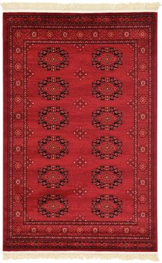 a red rug with black and white designs on it