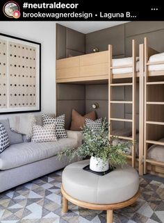 a living room with bunk beds and couches