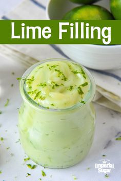 lime filling in a glass jar next to a bowl of limes