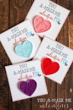 four valentine's day cards with hearts and words on them