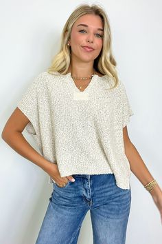 Details: Get ready to charm everyone you meet with our Necessary Charm V-Neck Knit Top! Its rolled split-neck design and side slits add a playful touch to this loose-fitting pullover. Perfect for any occasion, this top is a must-have in your wardrobe. - Short sleeves - V-neck - Oversized fit Content: 54% ACRYLIC 24% NYLON 22% POLYESTER Size + Fit: Models is 5'8" and wearing a SM - Measurements from a size SM are approx - Full length:22" - Chest: 56" - Waist: 54" - Sleeves: 6" Brand: Zenana Classy Casual Tops, Free People Inspired Outfits Fall, Cute Shopping Outfit, Cute Western Tops, Birthday Outfit Ideas For Women Casual, Cute Modest Tops, Cute Womens Clothes, Therapist Fits, Elegant Everyday Outfits