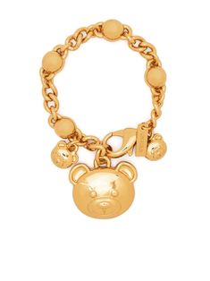 gold-tone polished finish curb chain signature Teddy Bear motif charm detail logo charm lobster claw fastening Luxury Charm Bracelet With Logo, Luxury Yellow Gold Charm Bracelet With Logo, Luxury Metal Bracelets With Gold-tone Hardware, Luxury Yellow Gold Chain Bracelet With Logo Charm, Luxury Metal Chain Charm Bracelet, Classic Gold Bracelet With Logo Charm, Designer Gold Bracelets With Logo Charm, Luxury Gold-tone Bracelet With Logo Charm, Luxury Gold-plated Chain Bracelet With Charms