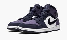 The Air Jordan 1 Mid “Sanded Purple” is a clean look for fans of the mid-top version of Michael Jordan’s first sneaker with Nike.  Like the high-top, the Air Jordan 1 Mid sports a timeless look that can be worn with a variety of looks and styles, making it an ideal design for those looking to add a throwback icon to their sneaker rotation.  The upper features a white leather base on the mid-panel with stealthy Sanded Purple leather covering the perforated toe, ankle collar, and heel.  Contrastin Sneaker Rotation, Jordan 1s, Purple Shoes, Swag Shoes, Air Jordans Retro, Nike Air Jordan 1, Clean Look, Purple Leather, Air Jordan 1 Mid