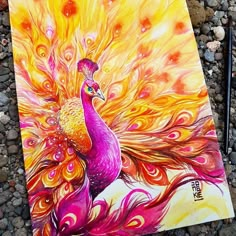 a painting of a colorful peacock on rocks