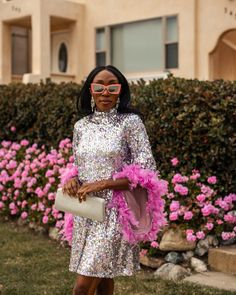 This shimmering rainbow of pastels mod mini dress has it all - glittering sequins, delicate mock neck, and long bell sleeves cuffed with rich pink feathers. An ode to the bold expression of the 1960s, this piece is a statement addition to any wardrobe. Dry clean to best preserve the sequins and feathers. Sizing:X-Small 0-2Small 4-6Medium 8-10Large 12-14X-Large 16-18 1970s Glam, Purple Time, Feather Cuffs, Mod Mini Dress, Bold Dresses, Eclectic Wedding, Alternative Wedding Dresses, Guest Attire, Time Warp