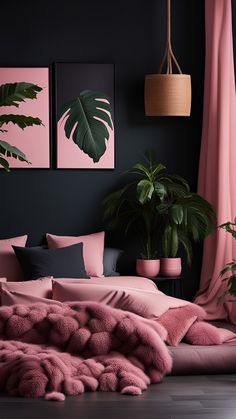 a bed with pink sheets and pillows in a dark room next to potted plants