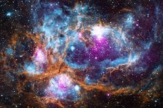 an image of some very pretty looking stars in the sky with purple and blue colors