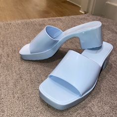 Never Worn. Will Fit 7-7.5 Perfectly, Jelly Sandal With 2 In. Heel I Think Light Blue Round Toe Casual Heels, Blue Platform Mules For Summer, Trendy Light Blue Sandals With Round Toe, Trendy Blue High Heel Mules, Blue Slip-on Jelly Sandals For Summer, Blue Closed Toe Jelly Sandals Casual, Blue Closed Toe Jelly Sandals, Blue Synthetic Jelly Sandals For Summer, Light Blue Block Heel Casual Heels