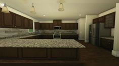 an empty kitchen with brown cabinets and marble counter tops