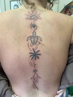 a woman with a tattoo on her back that has an image of a turtle and palm trees