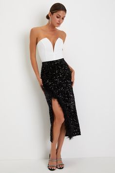 The Lulus Luminous Aura Black Sequin Feather High-Rise Tulip Midi Skirt is perfect for taking any party-ready look to the next level! This ultra-luxe velvet skirt is adorned with dazzling black sequins throughout as it shapes a high-rise fit and a pencil-style, overlapping silhouette that creates a faux-wrap effect as it falls to a modern midi hem. Fluffy feather trim accents the overlapping panel to lend an extra touch of glam! Hidden side zipper/clasp. Fit: This garment fits true to size. Leng Feather Trim Skirt, Nye 2024, Casual Formal Dresses, Lulu Fashion, Feather Trim, Casual Wedding Dress, Velvet Skirt, Tops Fall, Bottom Clothes