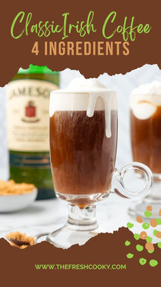 two glasses filled with liquid and topped with marshmallows next to a bottle of irish coffee