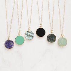 Gold Disc Necklaces: Lapis, Chrysoprase, Labradorite, Onyx, Moss Agate, Amazonite Stone: Lapis, Chrysoprase, Labradorite, Black Onyx, Moss Agate, Amazonite (pick from menu) Stone: 20mm diameter Gold chain: 14k gold filled Chain length: 16-18 inches (adjustable) Clasp: spring ring 14K GOLD FILLED CHAIN: About "Gold Filled Jewelry": Also called rolled-gold. These jewelry items are not actually filled with gold. They are made of a base metal covered by sheets of gold in a mechanical bonding proc... Layered Gold Jewelry, Gold Disc Necklace, Amazonite Stone, Gold Disc, Disc Pendant, Disc Necklace, Circle Necklace, Jewelry For Her, Agate Pendant