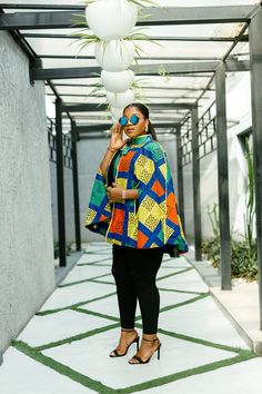 Introducing our Fully Lined African Print Cape. A statement and versatile piece that can be paired with jeans, dress, pants, bodysuits or skirts. Cape length approx 32/33 inch. Model wore L/XL. Disclaimer: Ace Kouture is committed to bringing you 100% REAL & Authentic African Fashion. ALL of our items are created with textiles Ankara wax prints and are handmade in Nigeria. African Print Clothing, Cruise Collection, Cape Dress, Wax Print, New Arrival Dress, Mommy And Me, Jeans Dress, African Print, African Fashion