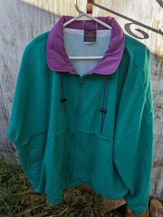 A perfect time capsule of 80s/90s wind breaker, near perfect condition. Retro Green Windbreaker For Spring, 90s Style Track Jacket For Spring Outdoor, Retro Spring Track Jacket For Outdoor, Retro Spring Windbreaker For Outdoor, Retro Green Windbreaker For Outdoor, 90s Style Spring Outdoor Track Jacket, Retro Oversized Windbreaker For Fall, 90s Style Fall Windbreaker, Vintage Green Windbreaker For Fall