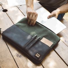 Elkton Waxed Canvas 15 Inch Laptop Case | Green w/ Dark Walnut Leather Waxed Canvas Laptop Bag For Daily Use, Rectangular Waxed Finish Laptop Bag For Business, Leather Wallets With Waxed Finish For Everyday Use, Waxed Finish Rectangular Laptop Bag For Business, Leather Wallet With Waxed Finish For Everyday Use, Classic Rfid Blocking Cases For Everyday Use, Functional Leather Wallet For Everyday Use, Rectangular Waxed Canvas Laptop Bag With Leather Trim, Functional Leather Wallets For Everyday Use