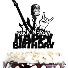 a rock n roll birthday cake with chocolate frosting