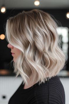 70+ Gorgeous Hair Color Trends For 2024 Short Hair With Lowlights Blonde, Dimensional Short Blonde Hair, Blonde With Subtle Lowlights, Blonde Wavy Lob, Angled Lob Haircut Thick Hair, Ash Blonde Wavy Hair, Blonde Bob For Fine Hair, Cool Blonde Lob, Short Shadow Root Blonde Hair