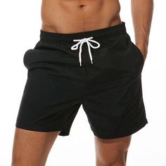 Season:Summer; Fabric:Polyester; Gender:Men's; Style:Boho,Stylish; Occasion:Outdoor,Going out,Holiday; Fit Type:Regular Fit; Function:Quick Dry; Waistline:Mid Waist; Pattern:Plain; Design:Pocket,with Mesh lining,Elastic Waist,Drawstring; Pants Type:Bathing Suit,Summer Shorts,Swim Shorts,Swim Trunks,Board Shorts; Fly Type:Elasticity,Drawstring; Front page:FF; Listing Date:02/22/2023; Production mode:External procurement; Hips:; Length:; Waist:; Fit US Size:null; Fit UK Size:null; Fit EU Size:null Bottoms With Built-in Shorts For Beach Party, Stretch Drawstring Shorts For Summer, Summer Bottoms With Built-in Shorts For Beach Party, Stretch Beachwear Shorts For Beach Party, Solid Color Beachwear Shorts For Summer, Stretch Beach Shorts With Pockets, Stretch Shorts For Beach Party, Black Swimwear With Pockets For Beach Season, Stretch Black Shorts For Summer