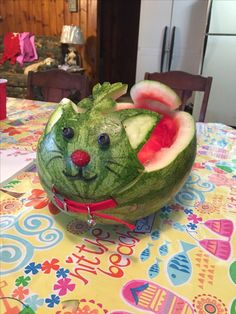 a watermelon carved to look like a cat