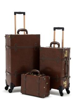 Inspired by the greatest period of traveling, the roaring 1920s, Cotrunkage’s handcrafted minimalism vintage luggage set features a dense wrap-around microfiber leather body that is complemented by heavy-duty corned stitching for maximum protection. The soft leather handle is plush to the touch and wears handsomely over time as the bronze TSA locks lighten with every adventure. We’ve also woven art print lining across the entire bag for a touch of detail and chic flair to sharpen your look. So p Suitcase For Women, Brown Luggage, Roaring 1920s, 3 Piece Luggage Set, Vintage Suitcase, Vintage Luggage, Carry On Suitcase, Train Case, Caramel Brown