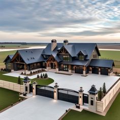 an aerial view of a large home in the country