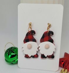 Gnome earrings Christmas elf dangles holiday fairy earrings handmade polymer clay cane holiday jewelry gift for her.  Hardware consists of gold plated wires and jump rings. Gnome Clay, Clay Earrings Christmas, Gnome Earrings, Fairy Earrings, Polymer Clay Cane, Earrings Christmas, Holiday Jewelry, Christmas Theme, Festive Holiday