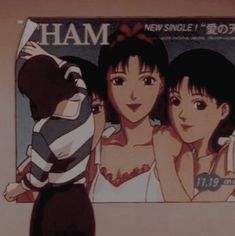 two young women standing next to each other in front of a sign that says ham