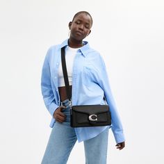 A modern take on an archival 1970s Coach design our structured Tabby shoulder bag is crafted of polished pebble leather. Finished with our Signature hardware for an iconic touch the compact 26 features two detachable straps to carry by hand style as a short shoulder bag or wear crossbody. | Coach Tabby Shoulder Bag 26 - Women's - Silver/black Coach Tabby Shoulder Bag, Tabby Shoulder Bag 26, Tabby Shoulder Bag, Crossbody Coach, Coach Tabby, Hand Style, Structured Shoulder, Polished Pebble, Signature Hardware