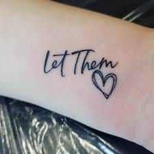 a tattoo that says let them with two hearts