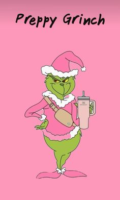 the grin is holding a drink and wearing a santa claus hat, while standing in front of a pink background