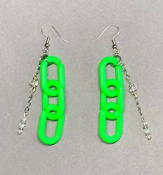 "Pop all the bottles with this sparkly set of neon green/silver chain link earrings! Featuring aurora borealis swarovski crystal glass, quartz & aquamarine beads for truth, wisdom & clarity.  All pieces were made using Swarovski Crystal + aquamarine + quartz beads + silver spacers, brass head pins, clasps, findings & wire. Green chain link is made of plastic. (Drop is 3\" long.) Items ship within 24 hours! CHECK OUT MY CUSTOM JEWELRY LISTING FOR A SIMILAR PIECE OR TO MAKE IT A FULL SET! 10% of all purchases in The Festival Shop will be donated to supporting homeless transgender youth & adults - My Friend's Place (Los Angeles), Trans Resistance Mass & Transanta!" Green Adjustable Chain Jewelry For Party, Green Jewelry With Adjustable Chain For Party, Green Nickel-free Party Earrings, Nickel-free Green Earrings For Party, Green Dangle Party Jewelry, Green Pierced Jewelry For Party, Green Dangle Jewelry For Party, Trendy Neon Jewelry For Party, Trendy Green Dangle Jewelry