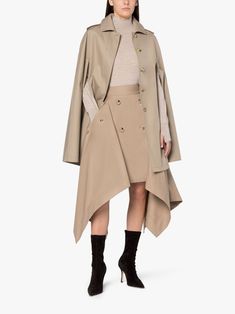 Halleigh cotton cape coat from MACKINTOSH featuring sand beige, cotton, cape design, concealed front button fastening, two side inset pockets, classic collar, epaulettes and straight hem. Beige Cape For Winter Workwear, Modern Cape For Workwear, Beige Cape For Fall Workwear, Oversized Beige Cape Outerwear, Elegant Beige Outerwear With Concealed Fastening, Long Sleeve Beige Cape For Work, Beige Long Sleeve Cape For Work, Luxury Beige Gabardine Outerwear, Beige Gabardine Outerwear With Concealed Placket