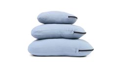 three pillows stacked on top of each other