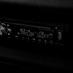 an old radio with the time displayed on it's display panel in black and white