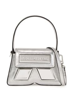 silver-tone calf leather metallic finish silver-tone logo plaque single top handle adjustable detachable shoulder strap foldover top with magnetic fastening main compartment internal logo patch Tone Calves, Chanel 2, Iconic Bags, Fine Earrings, Ballet Flat Shoes, Pump Sandals, Lady Dior, Karl Lagerfeld, Mini Bag