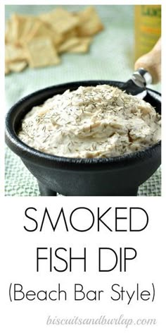 smoked fish dip in a black bowl on a green tablecloth with text overlay that reads smoked fish dip beach bar style